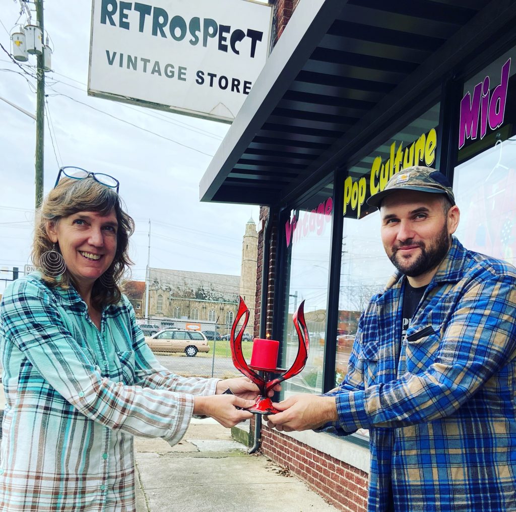 Photo of BJ Alumbaugh and Tree Griffin “passing the torch”