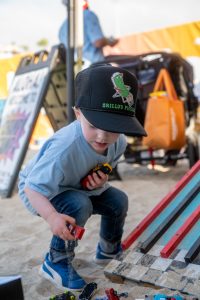 Kid playing in BeachLife Festival's Kids Zone